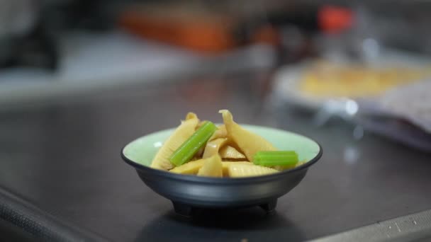 Steamed Bamboo Shoots Simmered Burdock Leaves — Stock Video