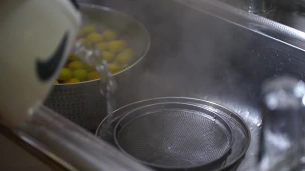 Woman Disinfecting Colander Boiling Water — Stockvideo