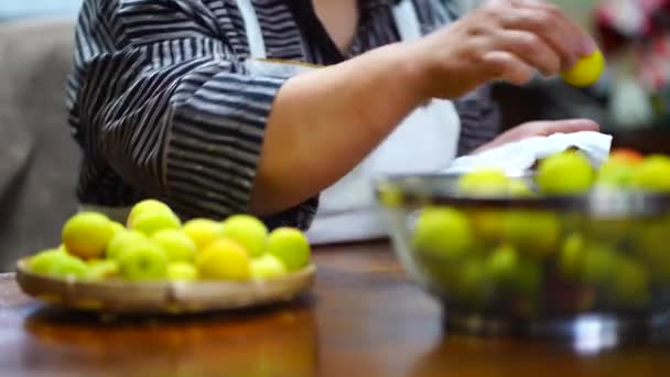 Woman Who Drains Washed Plums — Vídeos de Stock