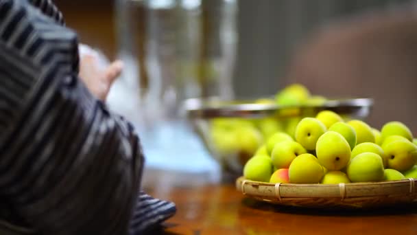 Woman Who Drains Washed Plums — Stock Video