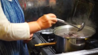 Woman making shiso juice