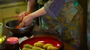 Woman holding a rice ball