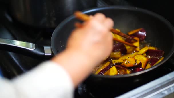 Woman Making Candied Sweet Potatoes — стоковое видео