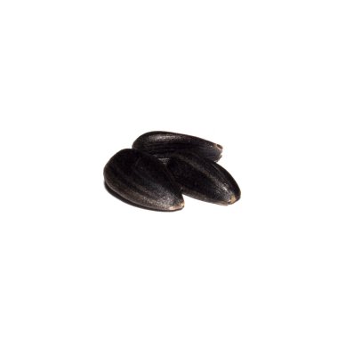 Beyaz arkaplanda ayçiçeği tohumları