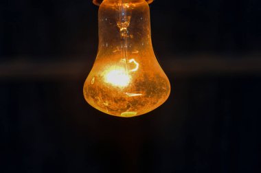 Light bulb in the night city