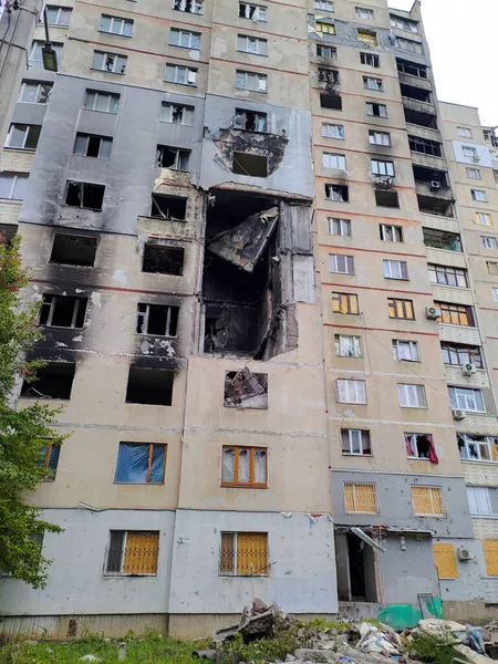 Consequences of the war in Kharkov, destroyed houses on Saltovka by Russian military shells, Ukraine