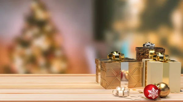 Christmas balls and gift box on wood table for holiday concept