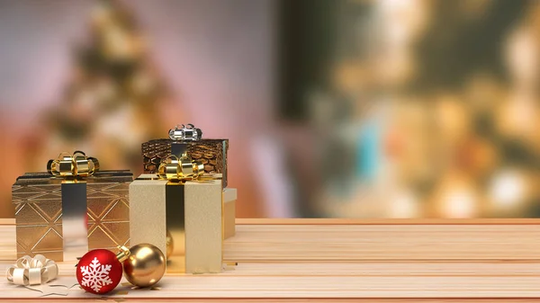Christmas balls and gift box on wood table for holiday concept