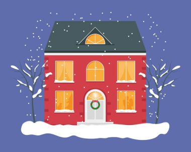 Karlı kış gecesi. Noel zamanı. Işıklı pencereli kırmızı ev