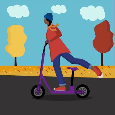 Sonbahar parkında elektrikli scooter süren ceketli bir kız..