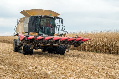 TERNOPIL REGION, UKRAINE - November 04, 2021 - combine CLAAS Lexion 750 harvester, ready to work on corn field