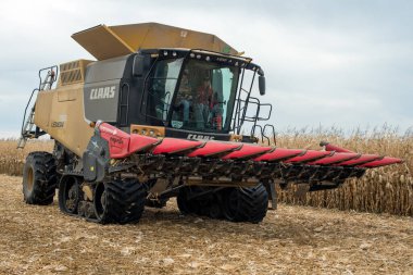 TERNOPIL REGION, UKRAINE - November 04, 2021 - combine CLAAS Lexion 750 harvester, ready to work on corn field