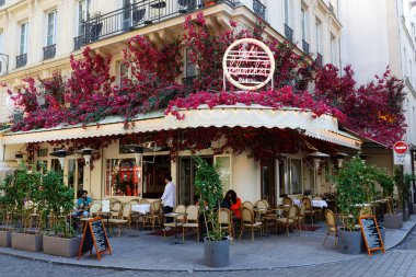 Paris, France-July 24, 2022 : Blanchet is corner cafe decorated with flowers. It located near the district of Chatelet in 1st district of Paris.