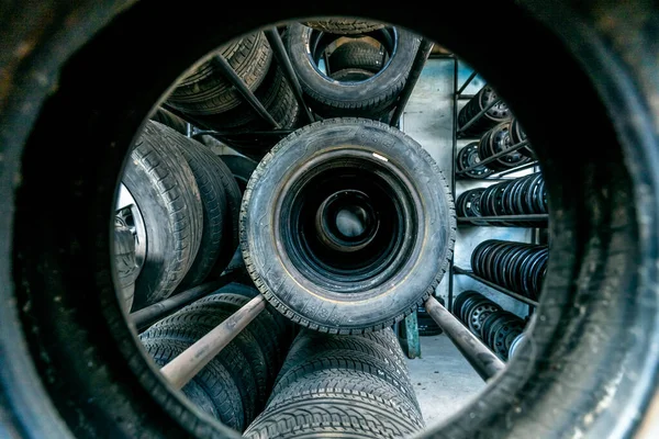 Use car tires on the shelf in stock — стоковое фото