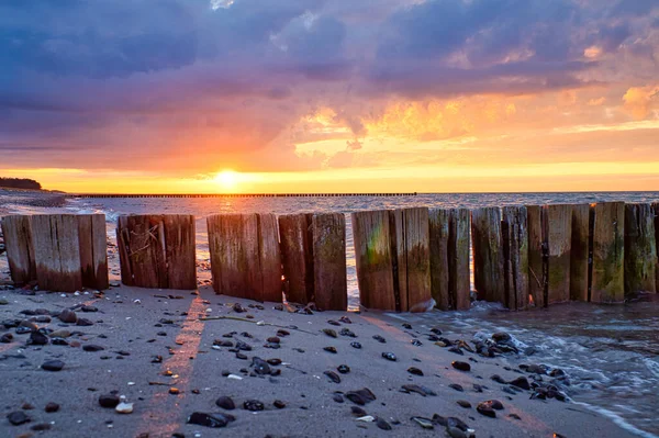 Groynes Jutting Sea Sunset Beach Stones Foreground Taken Zingst Darss — Stock fotografie