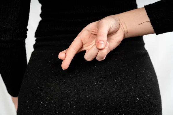 Close Crossed Fingers Woman Back Black Dress — Stock Photo, Image