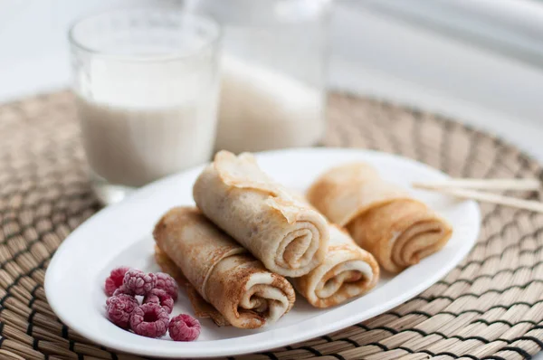 Pancakes Rolled White Plate Frozen Raspberries Wicker Napkin Stock Photo