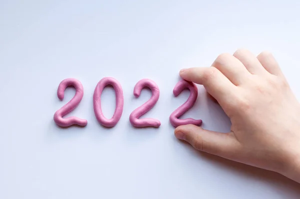 Number 2022 Made Pink Plasticine White Background Hand Holding Number — Stock Photo, Image