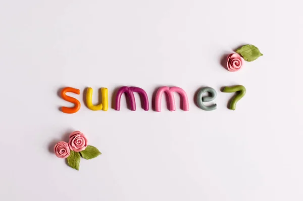 Word Summer Made Multicolored Plasticine Three Roses Leaves White Backgroun — Stock Photo, Image