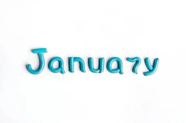 Λέξη Ιανουάριος Είναι Φτιαγμένη Από Μπλε Πλαστελίνη Λευκό Φόντο — Φωτογραφία Αρχείου