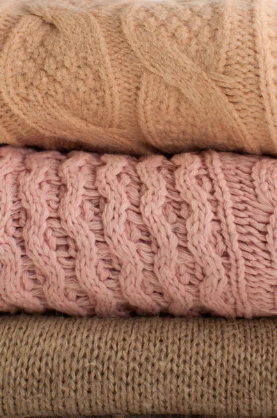 Three Textures Knitted Sweaters Beige Pink Colors Vertical Format — стоковое фото