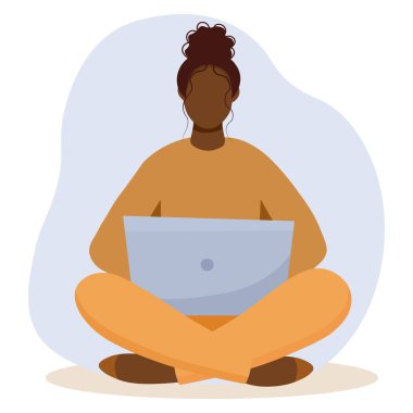 Black woman with a laptop working, student or freelancer concept