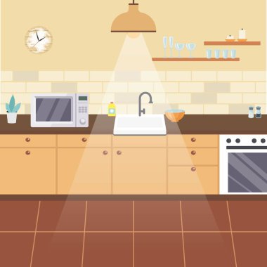 Mobilyaları kahverengi tonlarda olan mutfak.