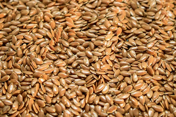 Flax seeds, Linum usitatissimum background usage texture — Stok fotoğraf