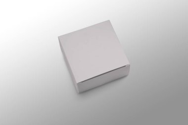 Boş boş karton ya da karton beyaz kutu, gri bir arkaplanda izole edilmiş gibi duruyor. sıfır atık içeriği. 3d oluşturma.