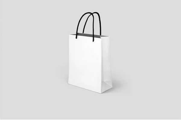 Порожній Білий Паперовий Пакет Покупок Ізольований Сірому Фоні Знущайся Концепція — стокове фото