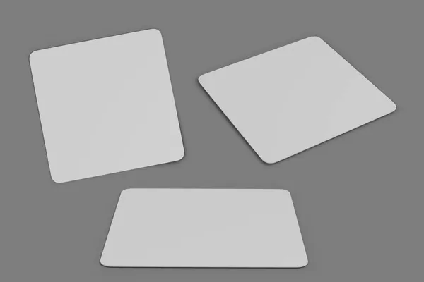 空白の白いマウスパッドのモックアップ灰色の背景に隔離された マットマウスパッドのフロントとサイドビュー 3Dレンダリング — ストック写真