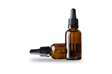 Two Amber glass dropper bottle mockup isolated on white background. cosmetic or medical bottle. 3d rendering.