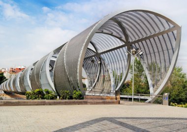Madrid, Spain, May 2018: The Arganzuela footbridge. Located in the Madrid Rio Park near Madrid beach and across the Manzanares river