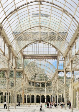 Madrid, Spain - May 2018: Crystal Palace (Palacio de cristal) in the Retiro Park interior view. It was built in 1887 to exhibit flora and fauna from the Philippines. The architect was Ricardo Velzquez Bosco