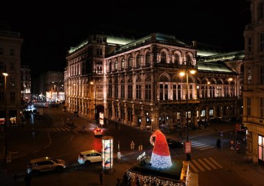 Vienna, Austria, Dec. 2019: Night view of the Vienna State Opera (Staatsoper), a famous opera house and theater located on the Ring street in central Vienna