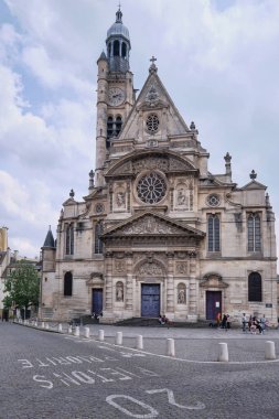 Paris, France - May, 2022: View of Church of Saint Etienne du Mont in Paris near Pantheon with cloudy sky