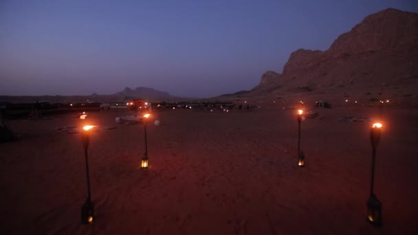 Torches Beach Tent Carpets Blurred Lights Candles Background — Video