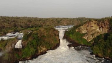 Drone shot over the African river and a powerful waterfall. High quality FullHD footage