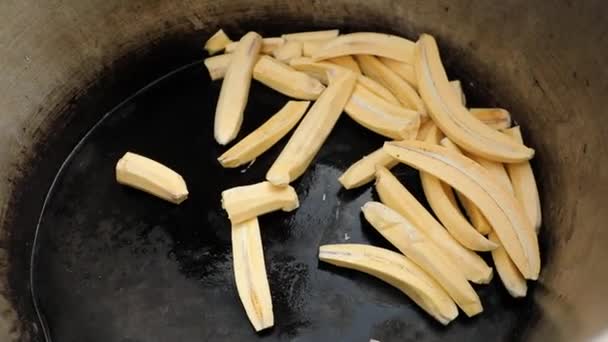 Peeled Bananas Cooked Frying Pan One Banana Thrown Others High — 图库视频影像