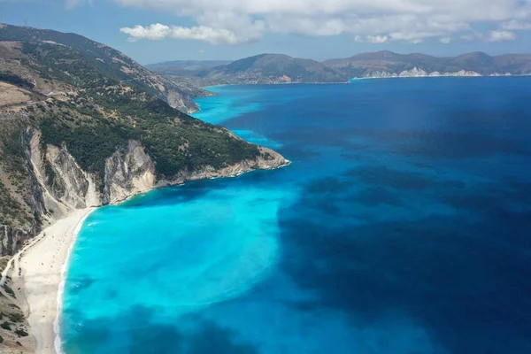 Blue turquoise ocean lagoon mediterranean rocky shore, drone aerial shot.. High quality image.