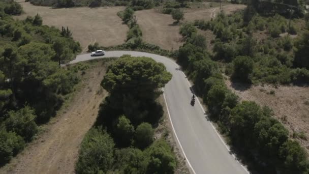 Aerial Shot Scooter Moving Curvy Road Green Hills — Vídeo de Stock