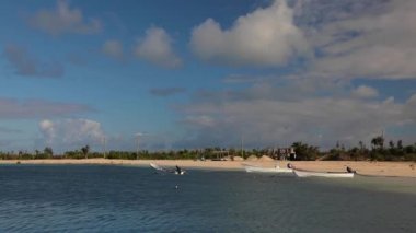 Pre stormy weather, troubled sky, fishermen boat is leaving the shore to ocean. High quality FullHD footage