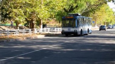 Old model of trolleybus, trackless trolley driving the street of Kherson Ukraine. High quality FullHD footage