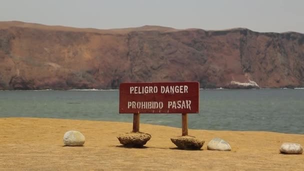 Title Saying Prohibited Danger Sign Violation Sandy Beach Ocean Rocks — Stockvideo