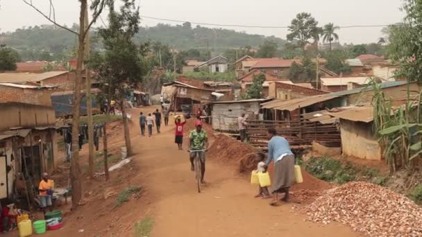 African Slum Street People Move Plastic Rubbish Very Poor District — стокове відео