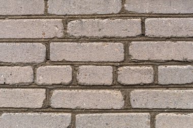 Eski, kirli, beyaz ve gri tuğla duvar arka planının yıpranmış dokusu. İnşa ediliyor.