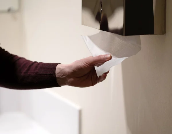 Close Photo Hand Public Toilet Tearing Paper — Zdjęcie stockowe