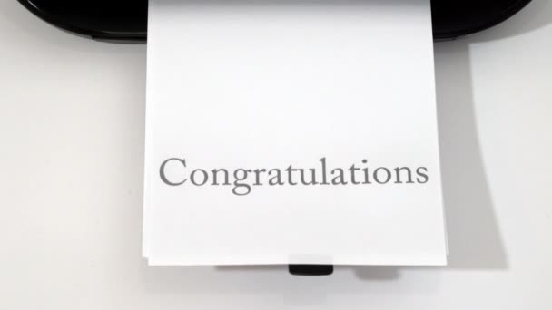Word Cogratulation Printed Sheet Paper — Stock Video