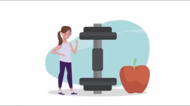 Dambıl ve elma gibi sağlıklı bir yaşam tarzı olan bir kadın.