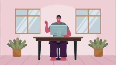 Masaüstünde çalışan genç adam